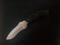 Tactical knife with black G-10 handle